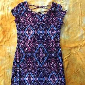 multi pattern dress with a cut out in the back